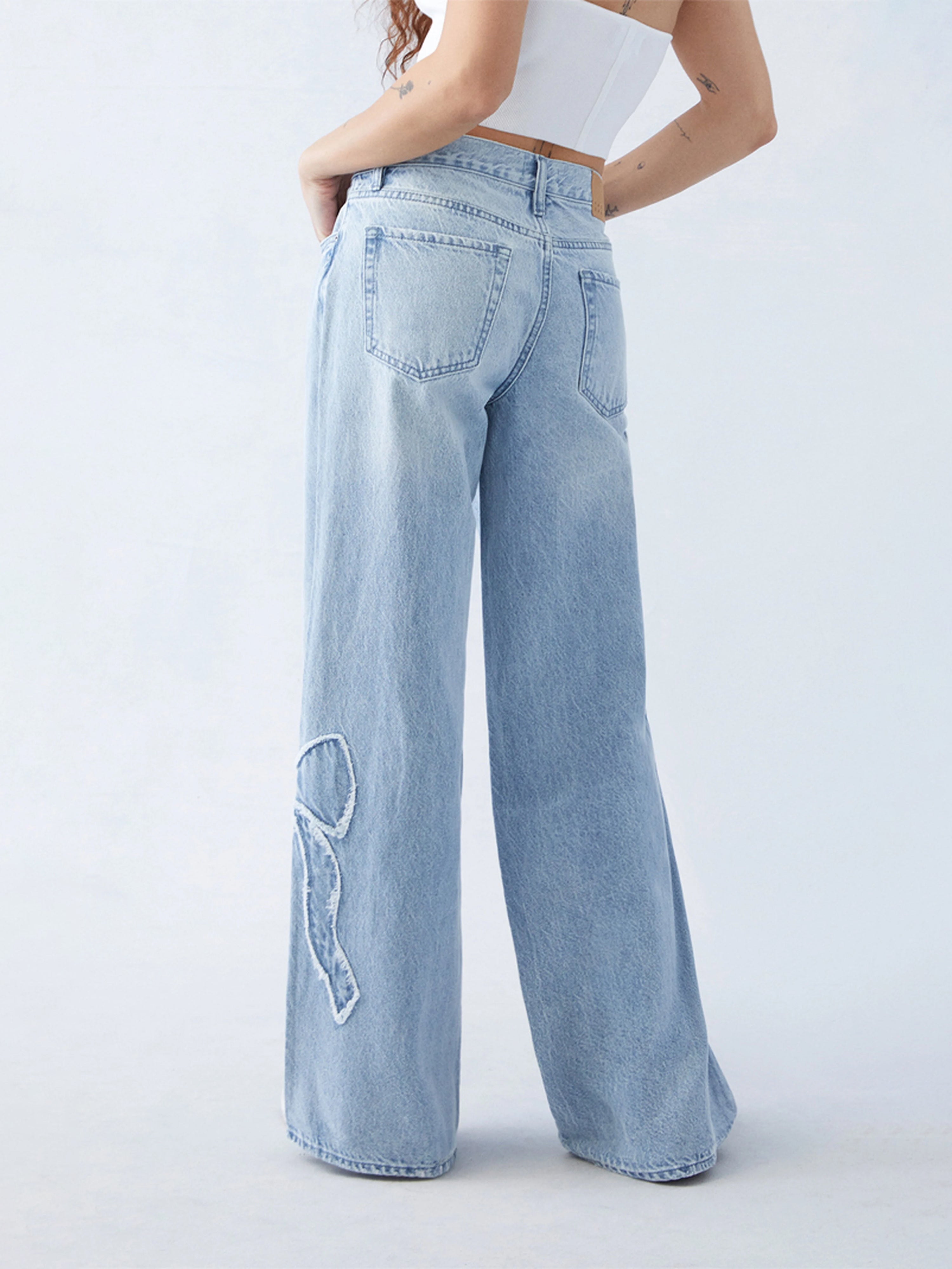 Selena | Baggy Bow Jeans